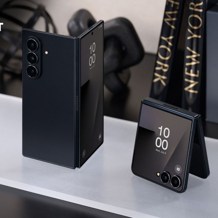 Modern foldable smartphone shown open and closed on a desk